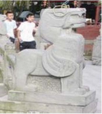 Figure 1. Side view of one stone statue.